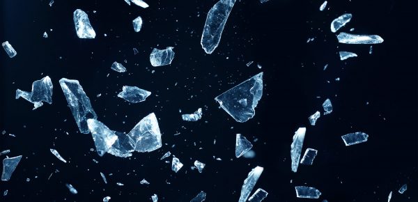 Broken crystal fragments on a black background